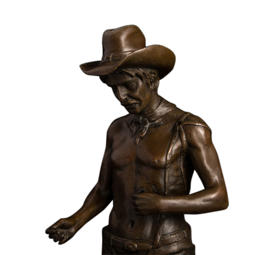 bronze cowboy statue