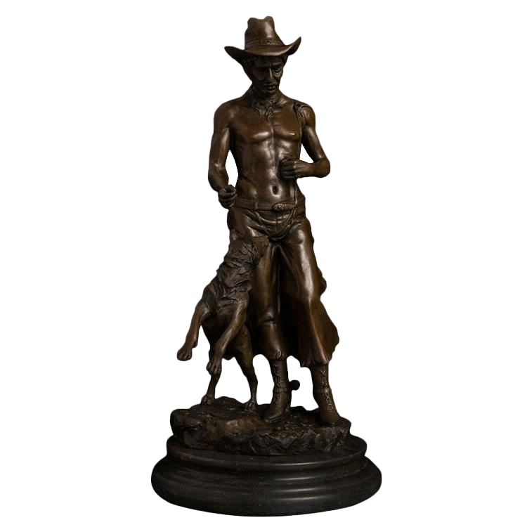 bronze cowboy statue