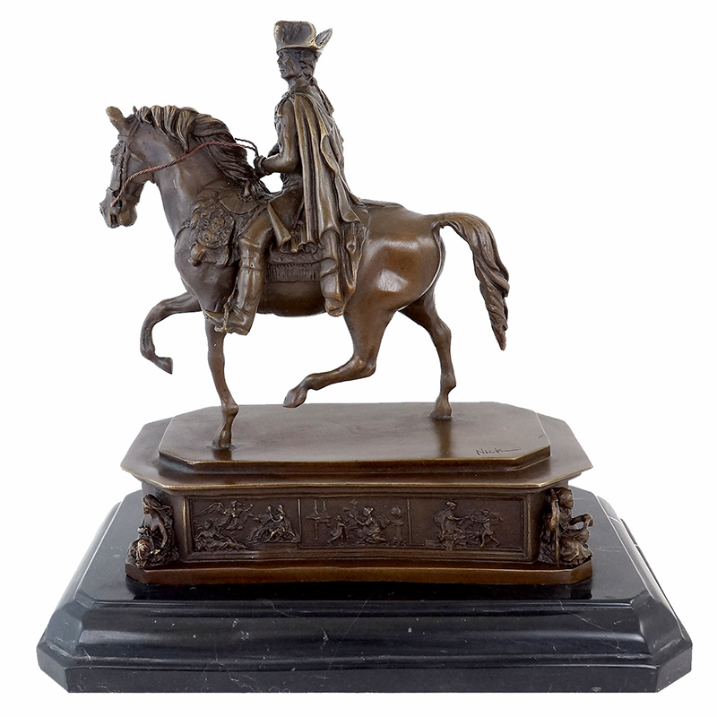 Man Riding Horse Statue