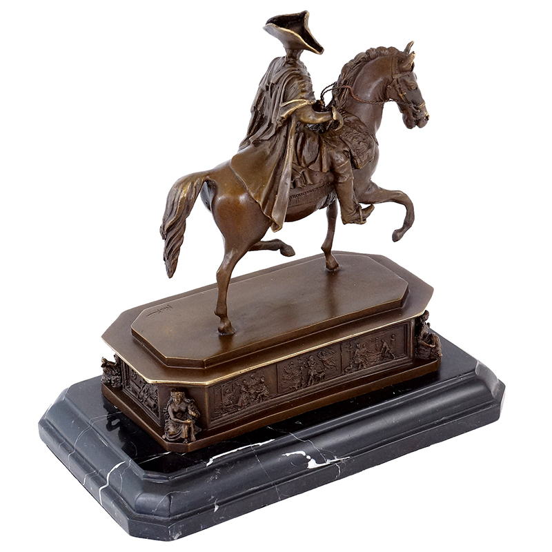 Man Riding Horse Statue