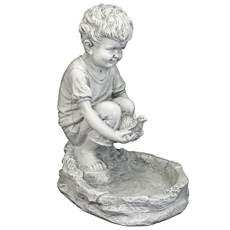 Boy With Turtle Statue