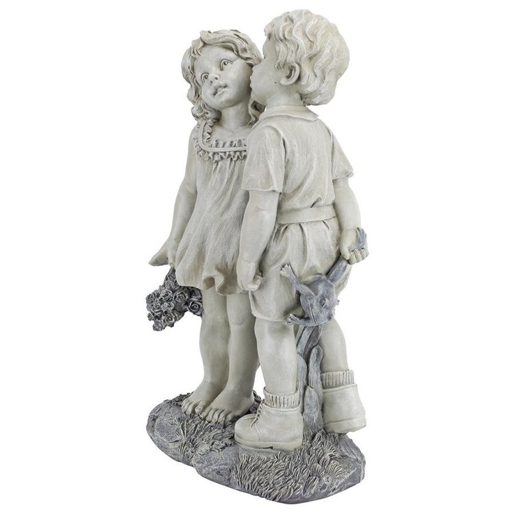 Boy and Girl Kissing Statue