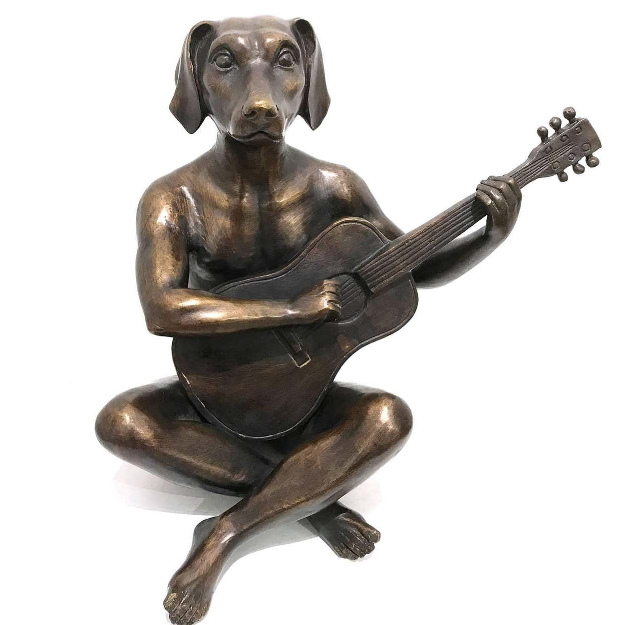 Dog Man Sculpture