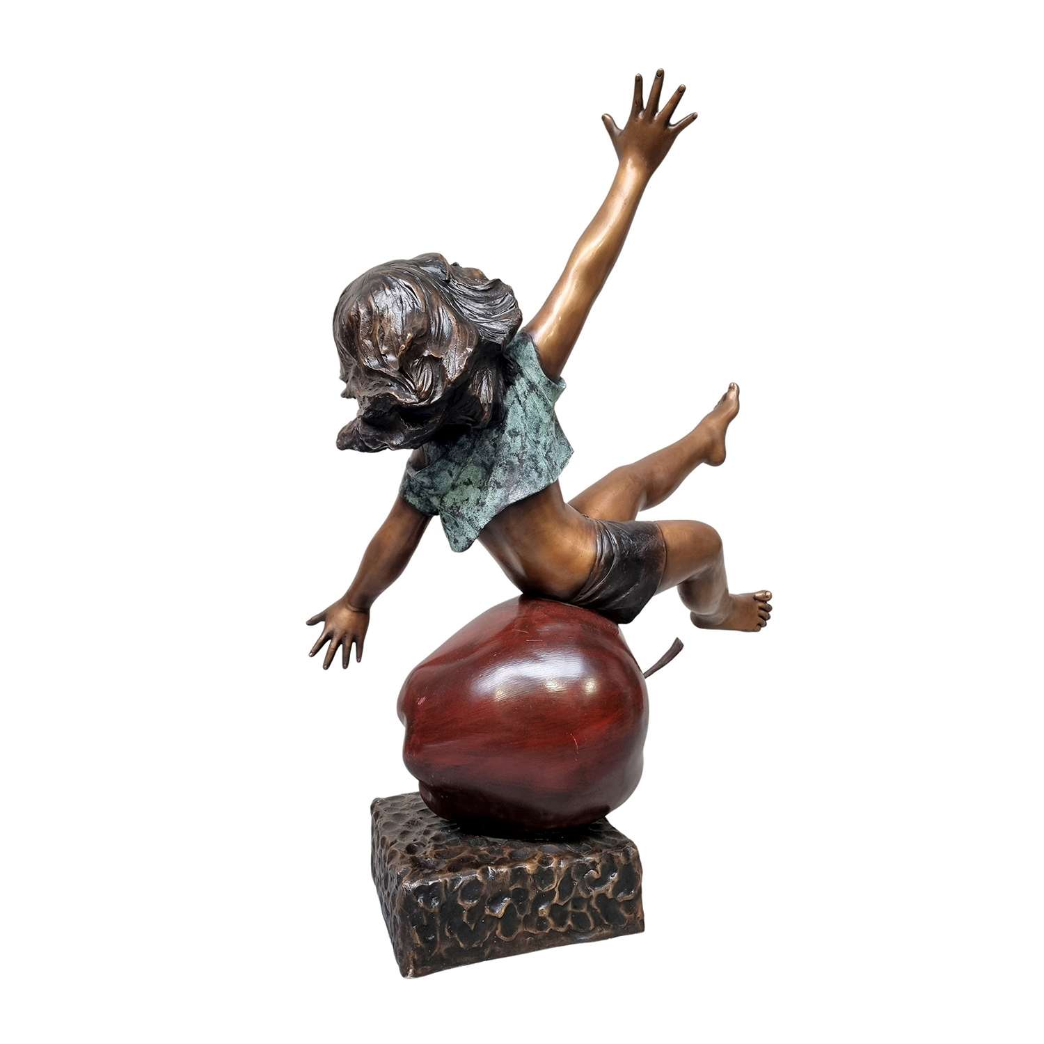 Girl Sitting on an Apple Sculpture