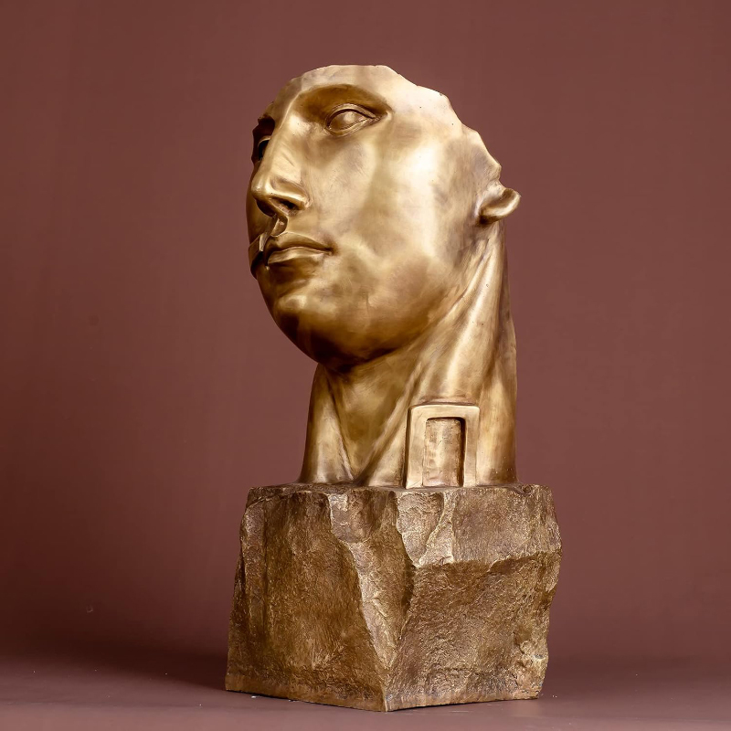 bronze face sculpture