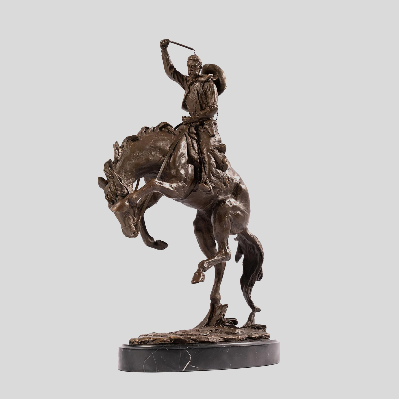cowboy on horse bronze statue