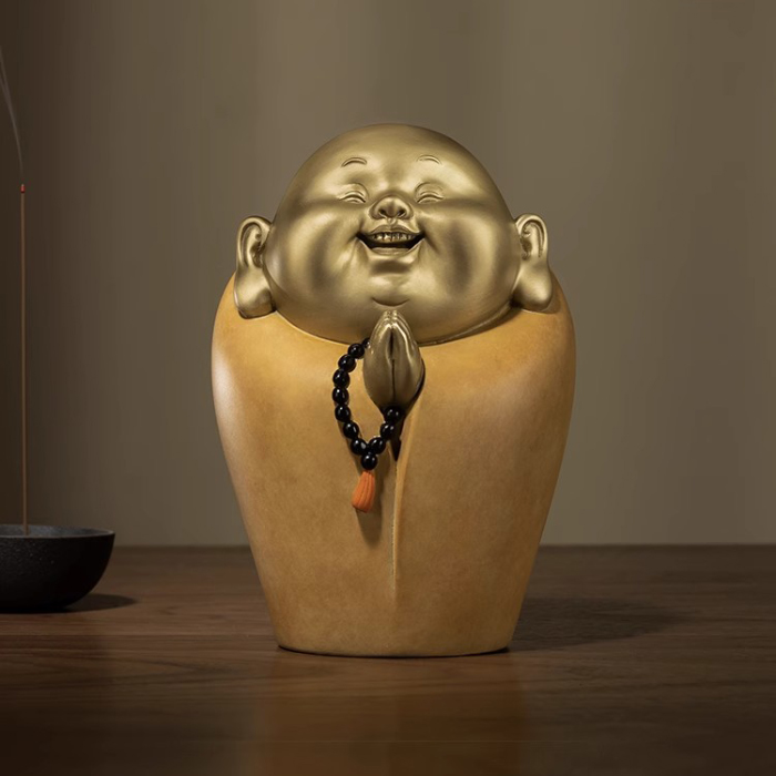 smiling monk statue