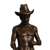 bronze cowboy statue