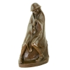 flute player sculpture