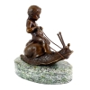 Boy Riding On Snail Statue