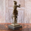 woman and bird sculpture