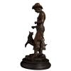 bronze cowboy statue