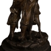 bronze cowboy statue
