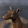 standing greyhound statue