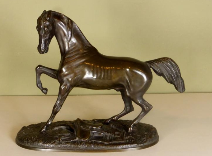 What is the meaning of a horse statue with its legs raised?