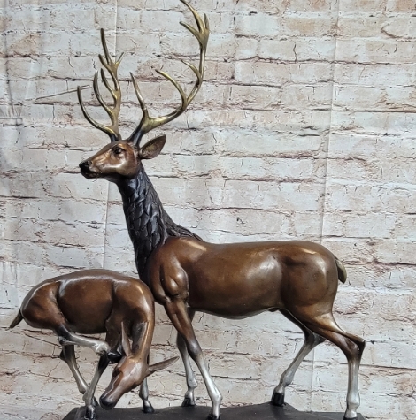 buck and doe figurines